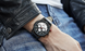 Mens Waterproof Sport Watch With Chronometers Day View And Cross-Matte Background Modern Man Watch