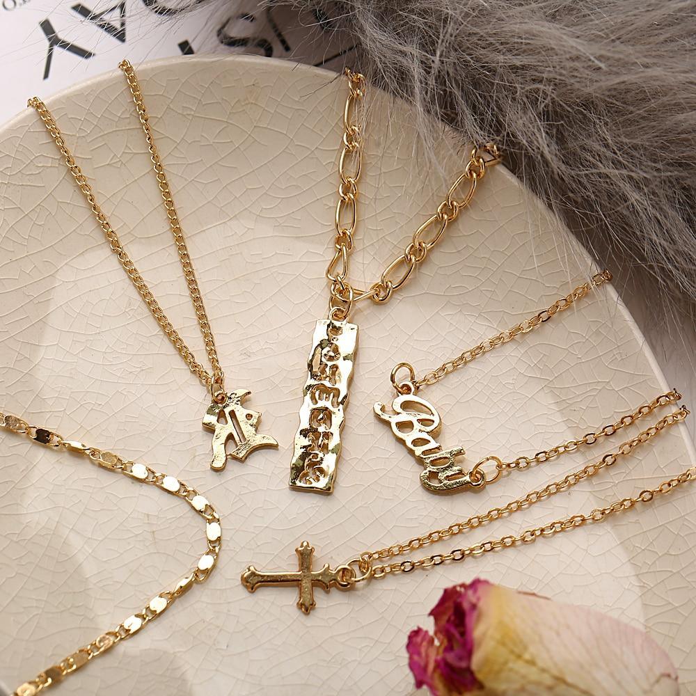 Modern Luxury Design Cross Gold Pendant Necklaces For Women In Gold Modern Jewelry Style