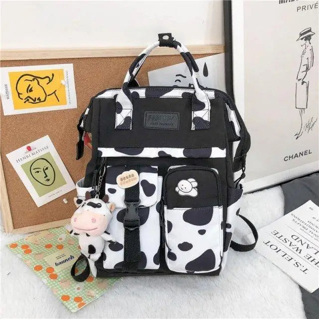 New Trendy Casual Women Purple Backpacks Fashionable Black Cow Pattern Travel Bag And School Bag for Teenager And Girls