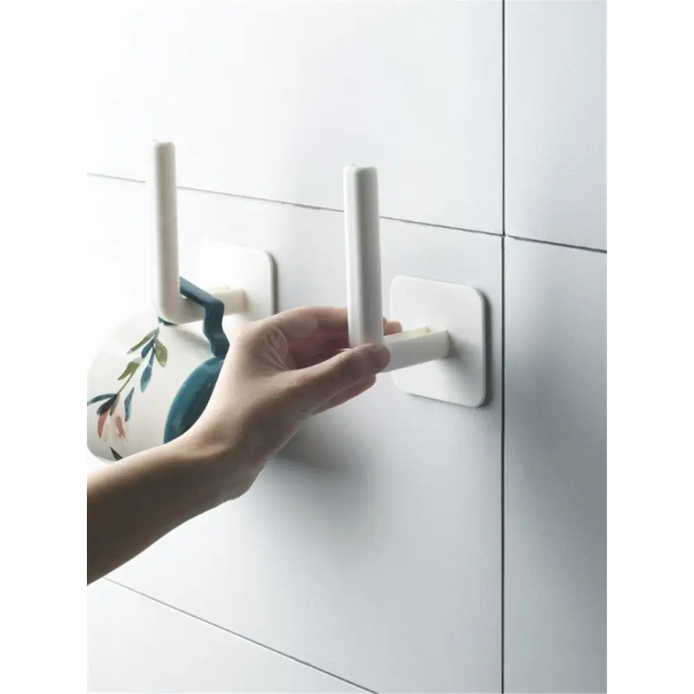 New Vigorous 1Pc Kitchen Self - adhesive Accessories Under Cabinet Paper Roll Rack Towel Holder Tissue Hanger Storage