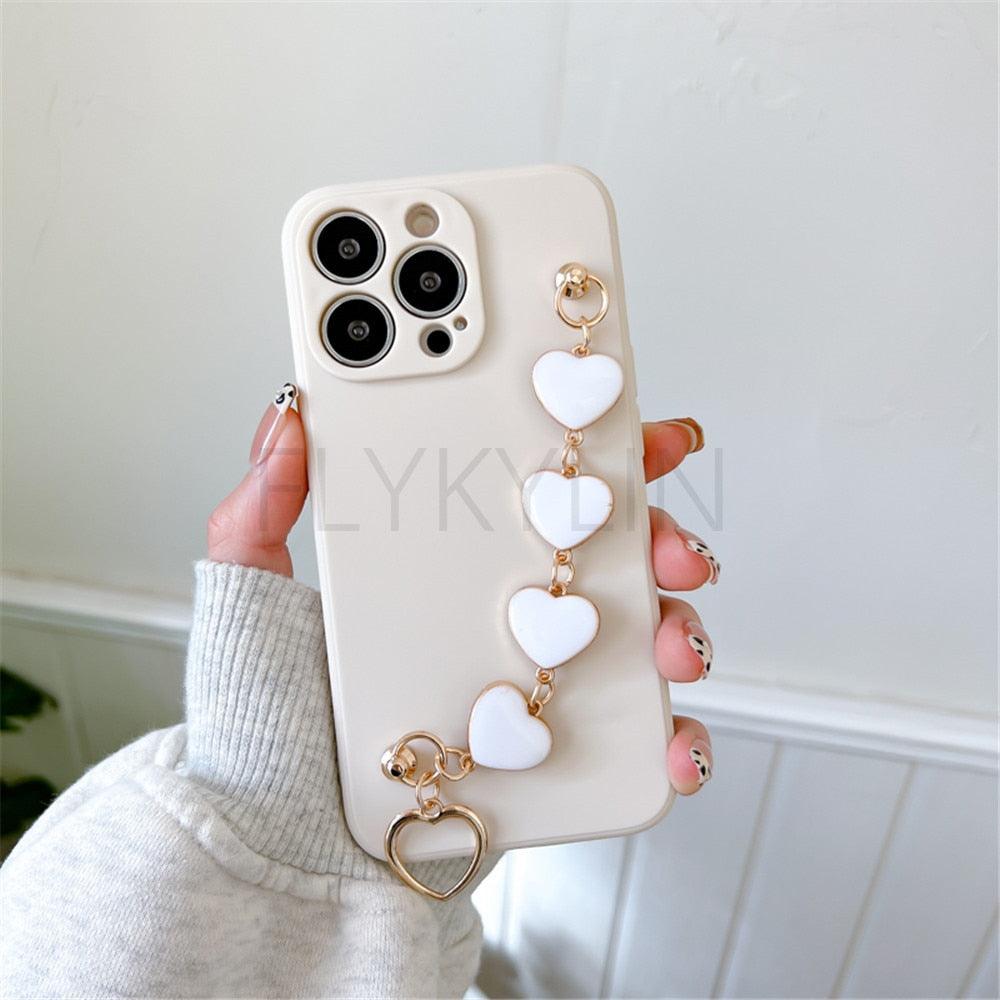 Soft Silicone Love Heart Chain Luxury Soft Flexible with Love Heart Chain Bracelet Hand Strap Girly Women Protective Cover for iPhone Wrist Bracelet Phone Case For iPhone 12 13 14 Pro Max Mini 11 Pro Max X XS Max XR 7 8 Plus