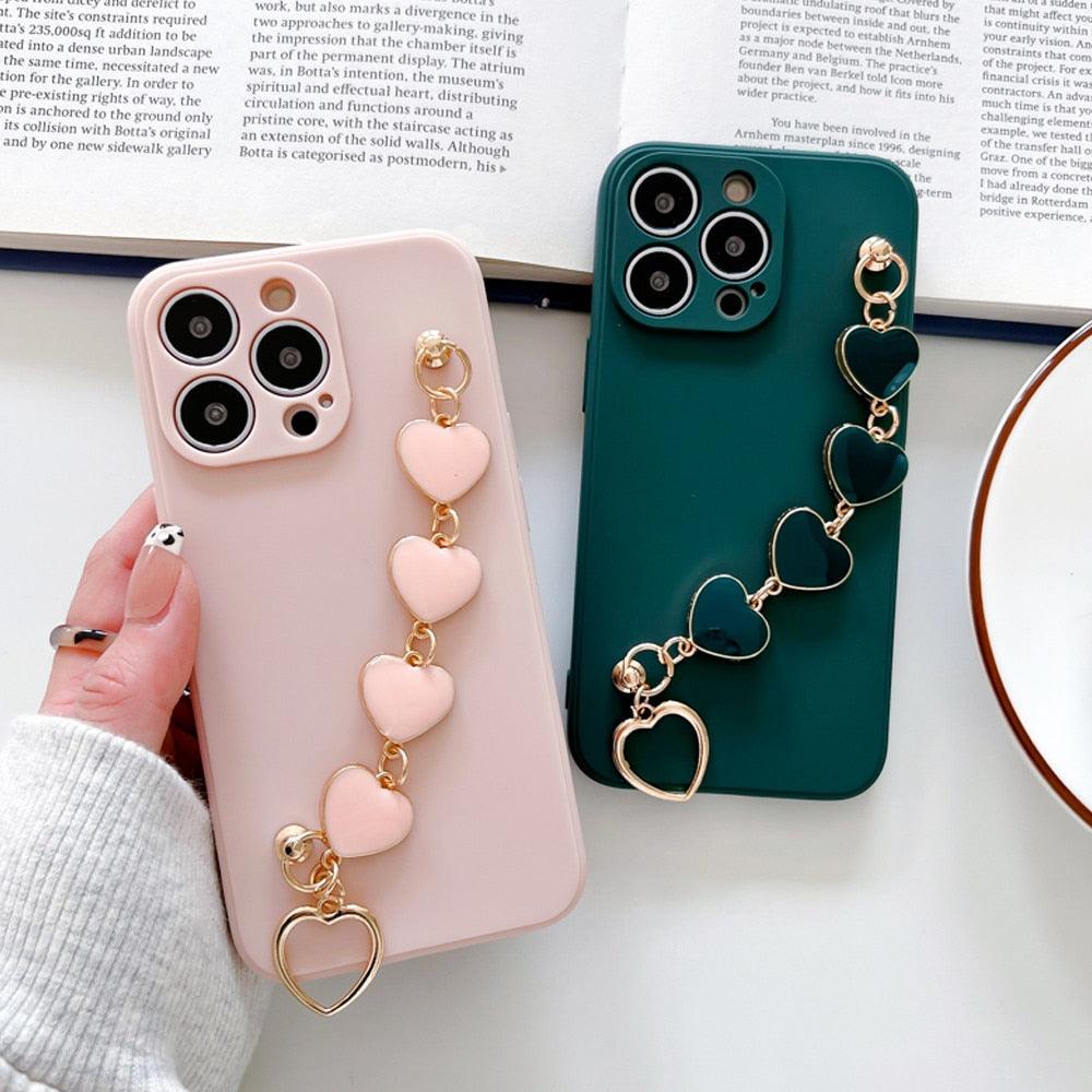 Soft Silicone Love Heart Chain Luxury Soft Flexible with Love Heart Chain Bracelet Hand Strap Girly Women Protective Cover for iPhone Wrist Bracelet Phone Case For iPhone 12 13 14 Pro Max Mini 11 Pro Max X XS Max XR 7 8 Plus