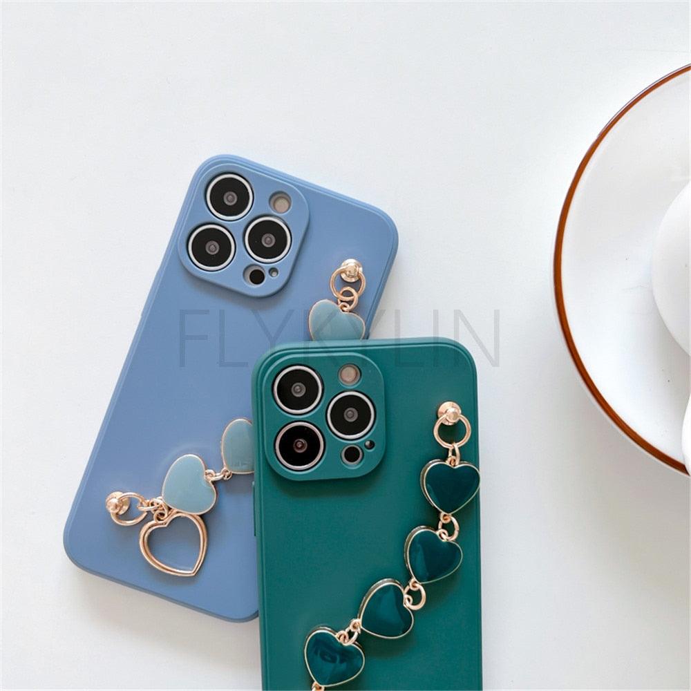 Soft Silicone Love Heart Chain Luxury Soft Flexible with Love Heart Chain Bracelet Hand Strap Girly Women Protective Cover for iPhone Wrist Bracelet Phone Case For iPhone 12 13 14 Pro Max Mini 11 Pro Max X XS Max XR 7 8 Plus