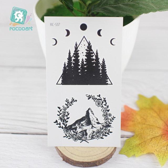 Black Temporary Waterproof Tattoo Sticker Mountains Tree Body Decoration Elegant Stylish Design - STEVVEX Beauty - 103, Arm Tattoo, Beauty, Black Tattoos, Body Tattoo, Fashion Tattoo, Girls Tattoo, Leg Tattoo, Luxury Tattoo, Men Tattoo, Modern Tatoos, Modern Tattoo, Moon Tattoo, Mountains Tattoo, Nature Tattoo, Small Tattoo, Stylish Tattoo, Tattoo, Waterproof Tattoo, Women Tattoo, Womens Tattoo - Stevvex.com