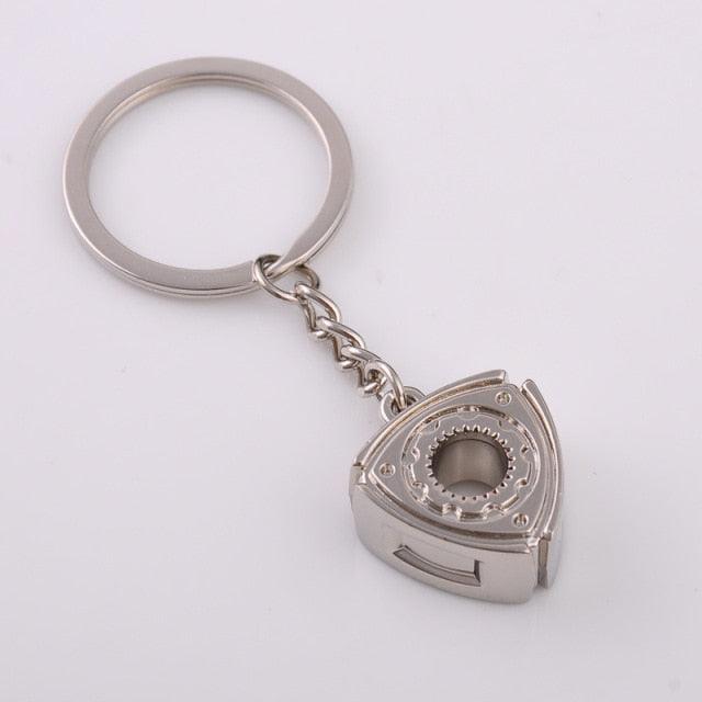 Creative Gift Car Metal Keychain Turbo Gear Hub Pendant Brake Disc Shock Absorber Pendant Alloy Short Quick Shifter Key Chain Ring Charming Auto Rainbow Metal Pendant Keyring Wheel Rim Tire Rotary Engine Keyring