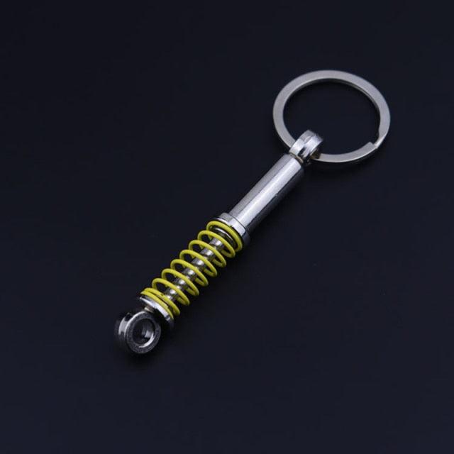 Creative Gift Car Metal Keychain Turbo Gear Hub Pendant Brake Disc Shock Absorber Pendant Alloy Short Quick Shifter Key Chain Ring Charming Auto Rainbow Metal Pendant Keyring Wheel Rim Tire Rotary Engine Keyring