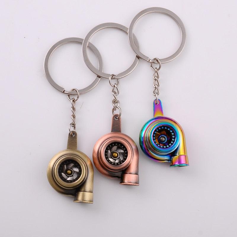 Creative Gift Car Metal Keychain Turbo Gear Hub Pendant Brake Disc Shock Absorber Pendant Alloy Short Quick Shifter Key Chain Ring Charming Auto Rainbow Metal Pendant Keyring Wheel Rim Tire Rotary Engine Keyring