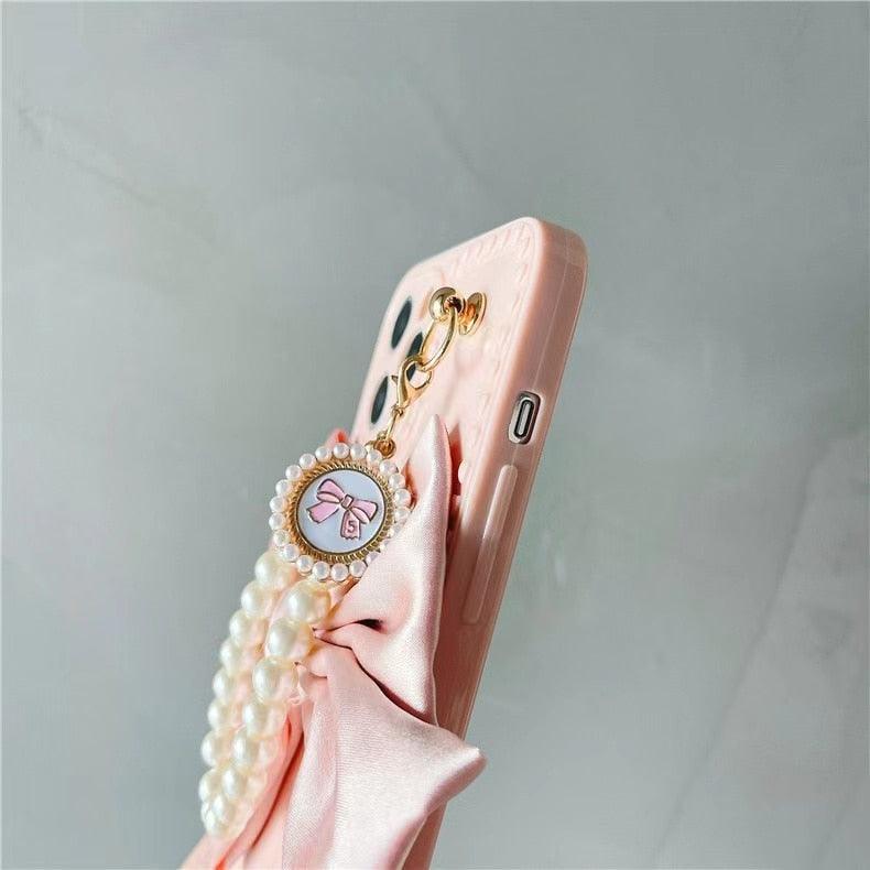 Cute Luxury Fashion 3d Bow Pearl Bracelet Girl Soft Case For iPhone 11 12 13 Pro Max 7 8 Plus Xr X Xs Se Anti-drop Cover Pearl Chain Bow Phone Case Ideal for iPhone Elegant Phone Case