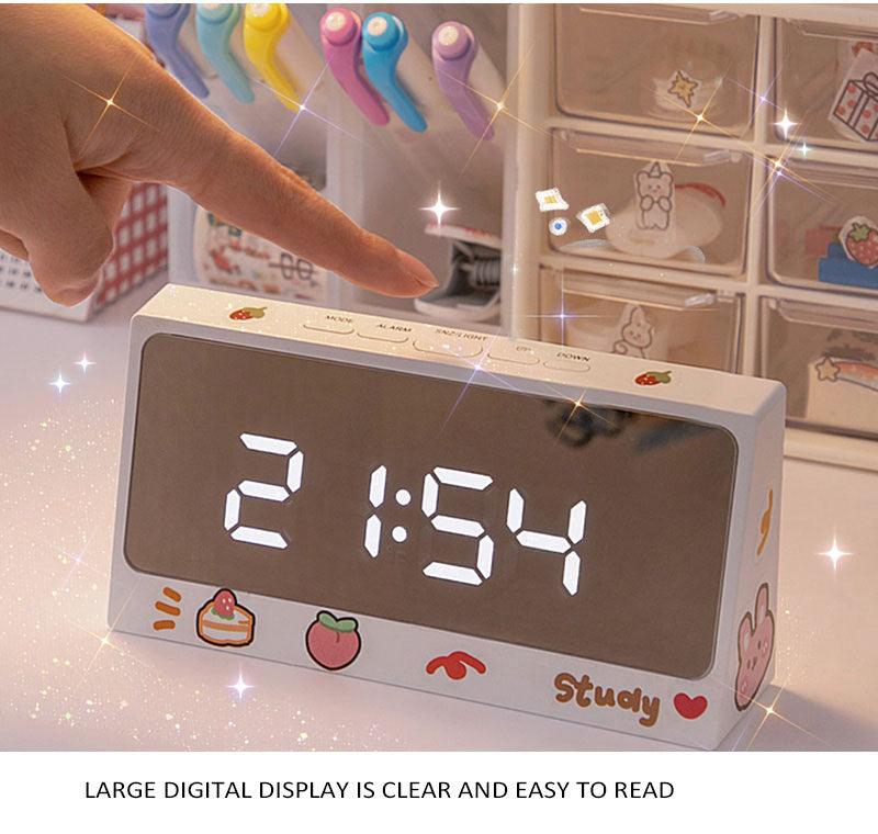 Digital Clock Table Clock Snooze Alarm Cute Silent Mirror Clock Student Desktop Mirror Surface LED Alarm Clock with USB Charger 12/24H Easy Snooze Function Adjustable Brightness Alarm Clocks for Bedroom LED Clock Electronic Clock for Children