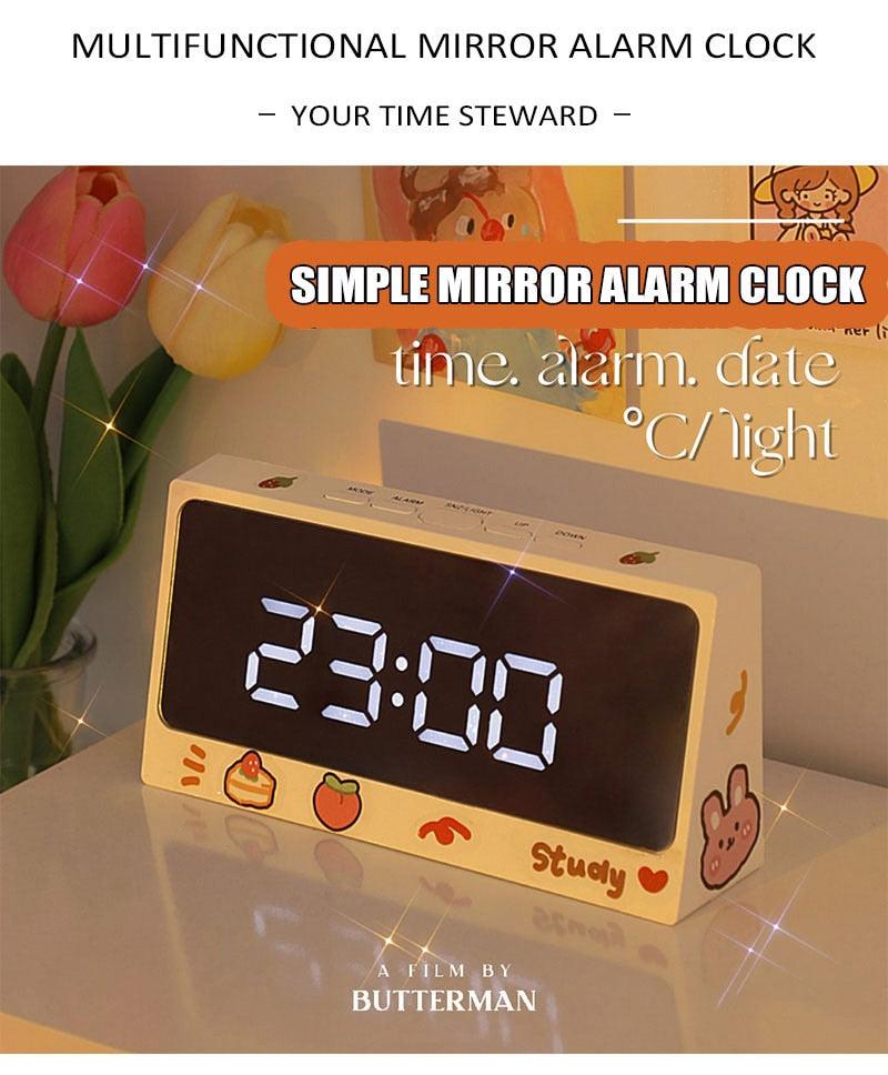 Digital Clock Table Clock Snooze Alarm Cute Silent Mirror Clock Student Desktop Mirror Surface LED Alarm Clock with USB Charger 12/24H Easy Snooze Function Adjustable Brightness Alarm Clocks for Bedroom LED Clock Electronic Clock for Children