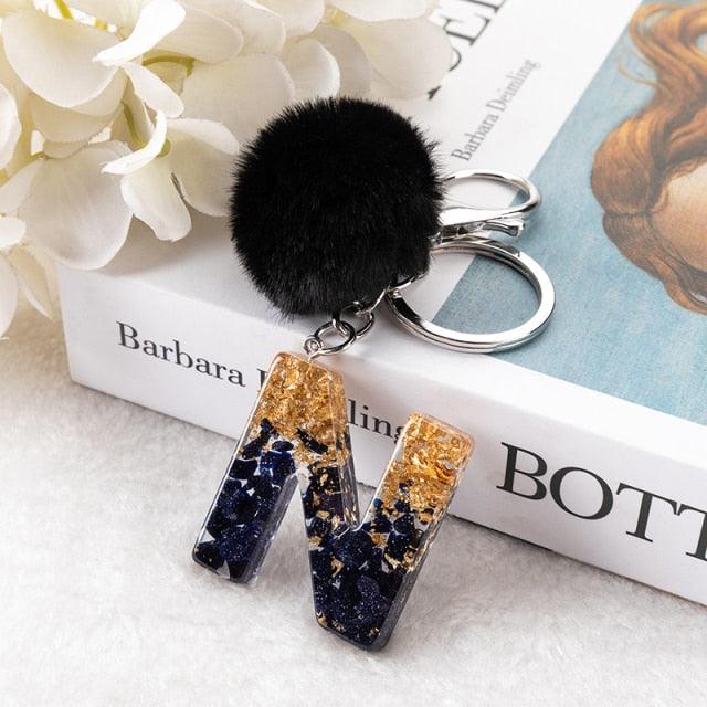 Luxury Black Pompom English Alphabet Letter Keychain Rhinestone Keyring with Artificial Fur Pompom Ball Women Girls Shiny Crystal Key Ring Letter Keyring Glitter Gradient Resin Car Mirror Accessory Women Handbag Charms