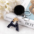 Luxury Black Pompom English Alphabet Letter Keychain Rhinestone Keyring with Artificial Fur Pompom Ball Women Girls Shiny Crystal Key Ring Letter Keyring Glitter Gradient Resin Car Mirror Accessory Women Handbag Charms