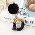 Luxury Black Pompom English Alphabet Letter Keychain Rhinestone Keyring with Artificial Fur Pompom Ball Women Girls Shiny Crystal Key Ring Letter Keyring Glitter Gradient Resin Car Mirror Accessory Women Handbag Charms