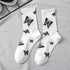 Women Korea Funny Socks Long Socks Black Cool Socks Harajuku GD Hip Hop Cotton Skateboard Socks Men New Trend Daisy Socks Men